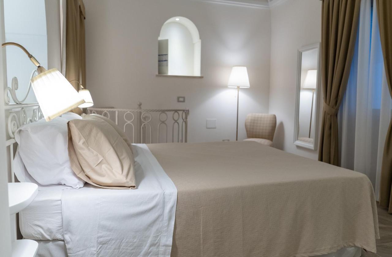 Insula Lubrensis Flat Apartment มัสซาลูเบรนเซ ภายนอก รูปภาพ